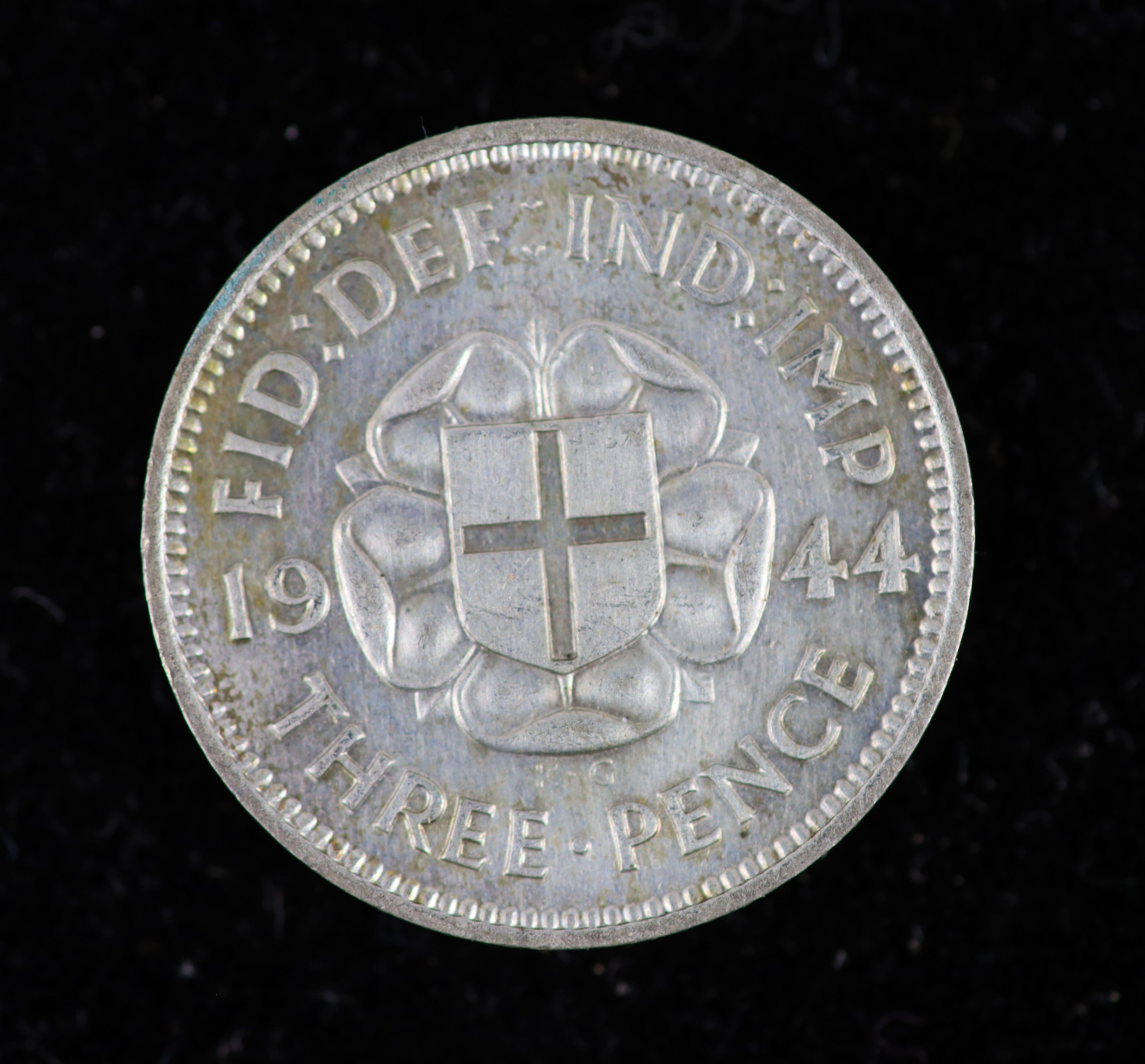 George VI specimen coin sets for 1944 and 1945, including the rare 1944 silver threepence, first coinage, all about EF or better